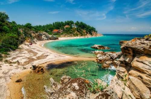 Wild beautiful beach with turquoise water in Vourvourou, Sithonia, Greece