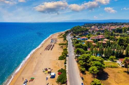 Skala, one of the top beach locations on the Greek island of Kefalonia. Spectacular view over beach of Skala. Skala beach with soft sand and turquoise water in Kefalonia, Greece.