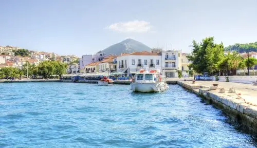A view of the port of Pylos, a Greek city in Peloponnese (south Greece) and some local architecture in the background. Pilos is also known as Neokastro and it is located in Messinia. Pylos is one of the safest ports in the Mediterranean